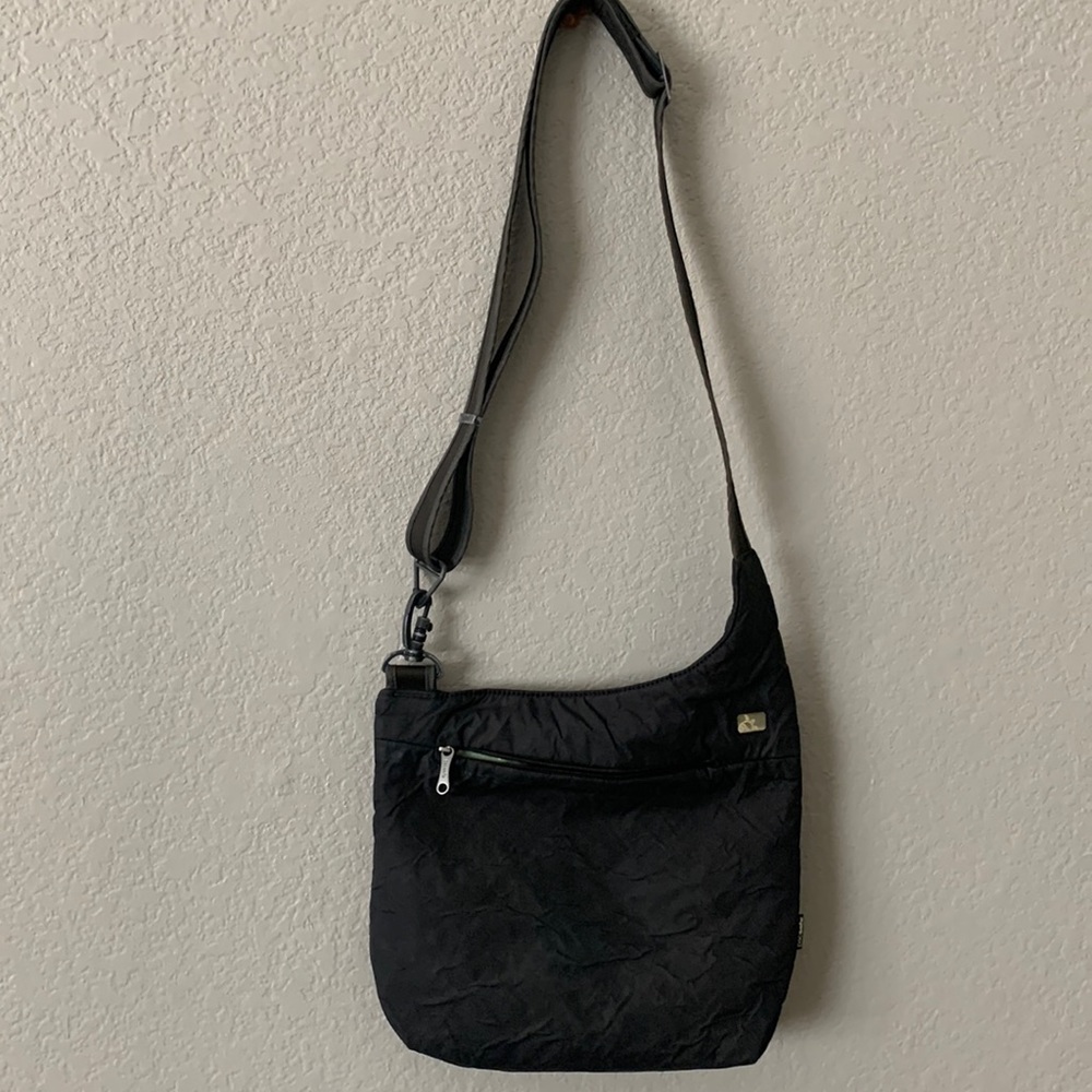 Pacsafe anti-theft cross body TRAVEL bag